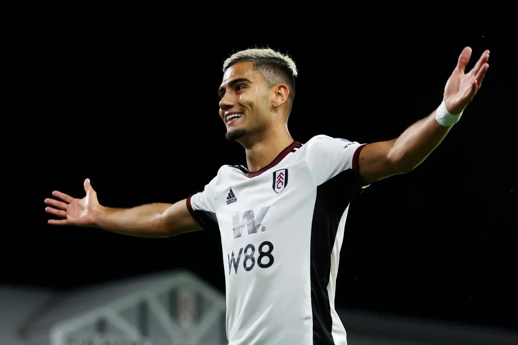 LONDON, ENGLAND – AUGUST 30: Andreas Pereira of Fulham celebrates after their team’s second goal, an own goal scored by Lewis Dunk of Brighton &amp; Hove Albion during the Premier League match between Fulham FC and Brighton &amp; Hove Albion at Craven Cottage on August 30, 2022 in London, England. (Photo by Bryn Lennon/Getty Images)