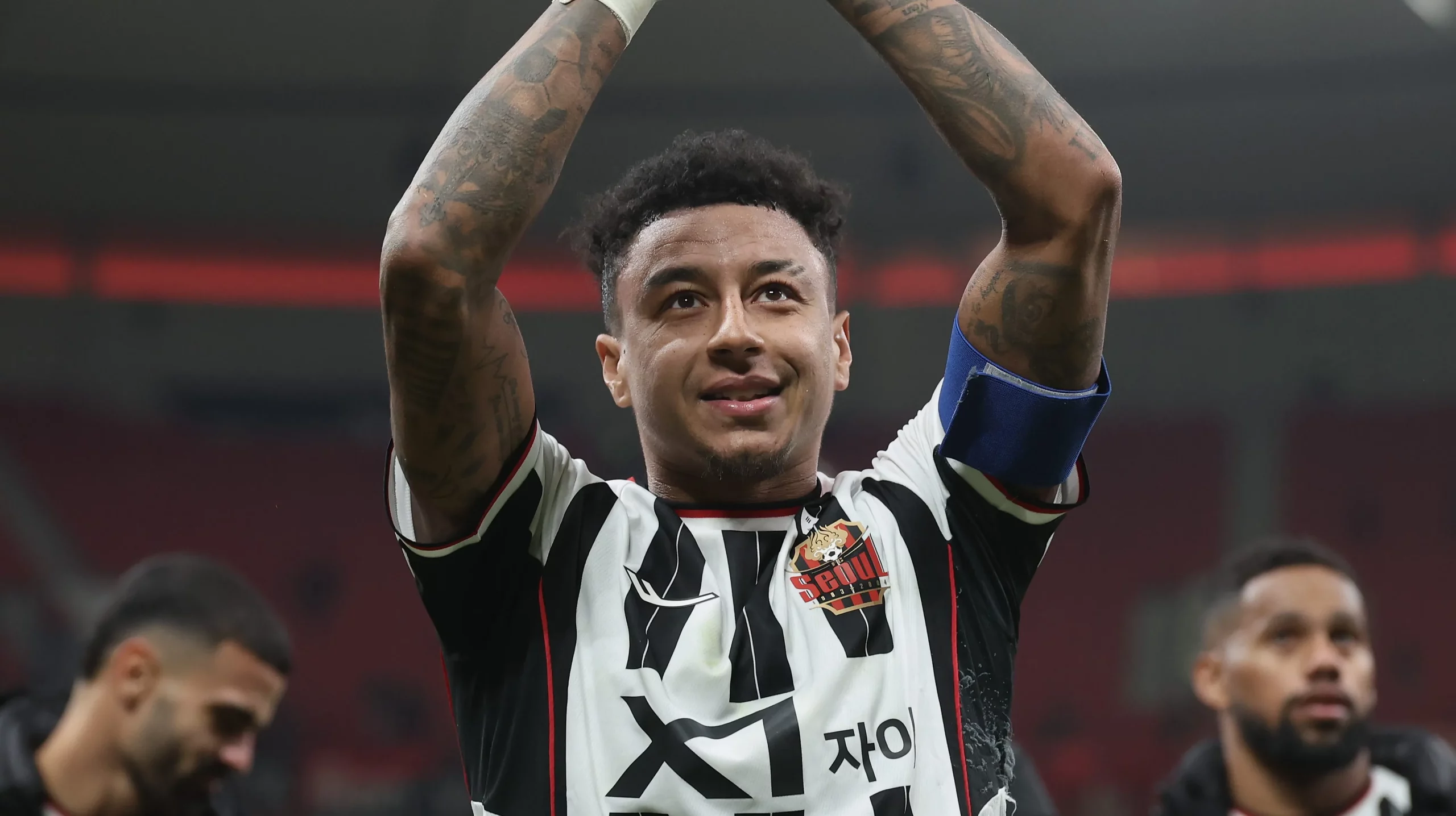 SHANGHAI, CHINA – NOVEMBER 25: Jesse Lingard  #10 of FC Seoul with teammates salute the supporters following the AFC Champions League Elite 2025-26 East Region Group Stage match between Shanghai Port and FC Seoul at Pudong Football Stadium on November 25, 2025 in Shanghai, China. (Photo by Lintao Zhang/Getty Images)