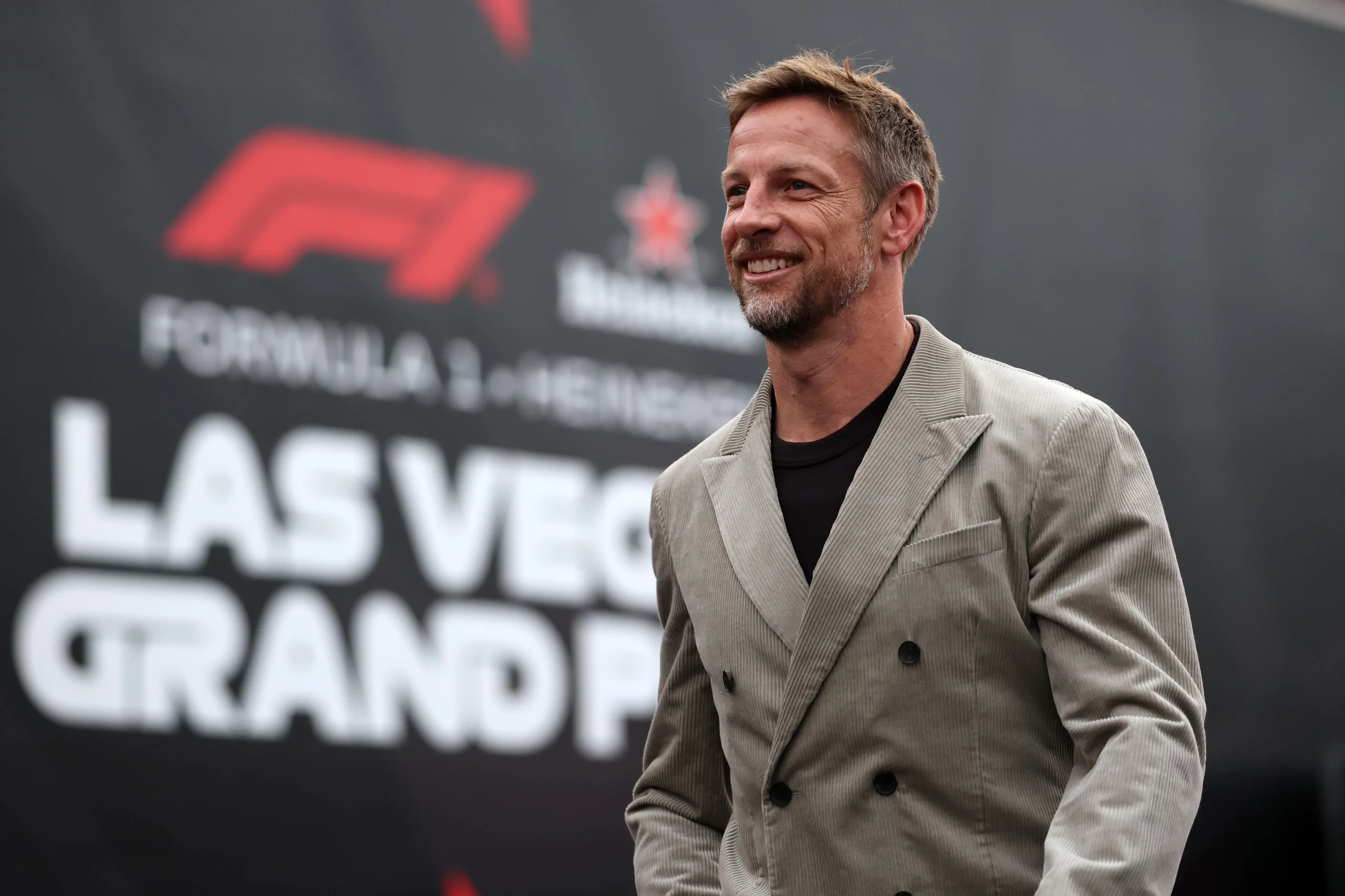 LAS VEGAS, NEVADA – NOVEMBER 21: Jenson Button arrives in the Paddock prior to final practice ahead of the F1 Grand Prix of Las Vegas at Las Vegas Strip Circuit on November 21, 2025 in Las Vegas, Nevada. (Photo by Chris Graythen/Getty Images)