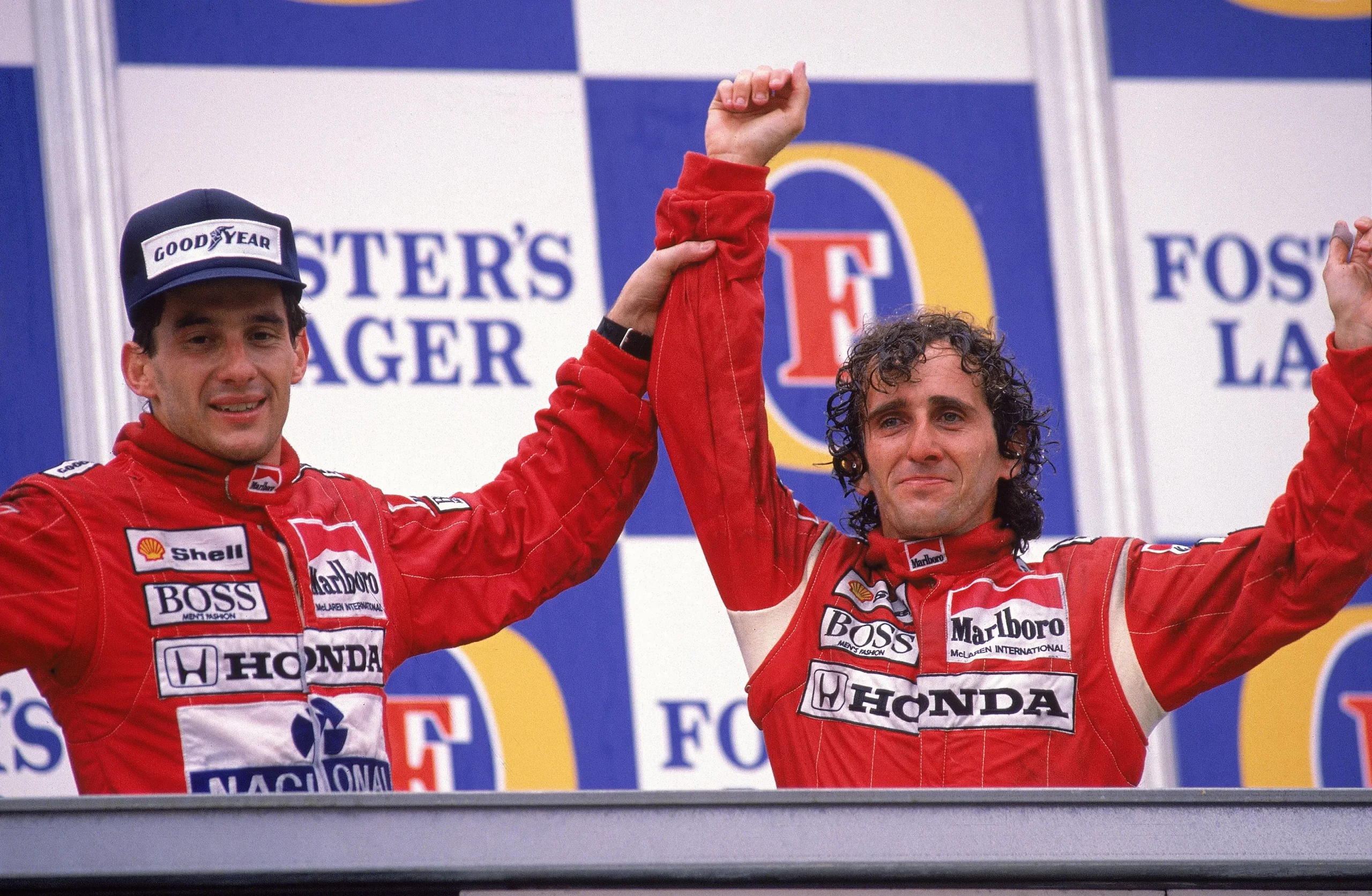 13 Nov 1988:  McLaren Honda driver Alain Prost of France celebrates his victory with team-mate Ayrton Senna of Brazil who finished second after the Australian Formula One Grand Prix held in Adelaide, Australia.  Mandatory Credit: Tony Feder /Allsport
