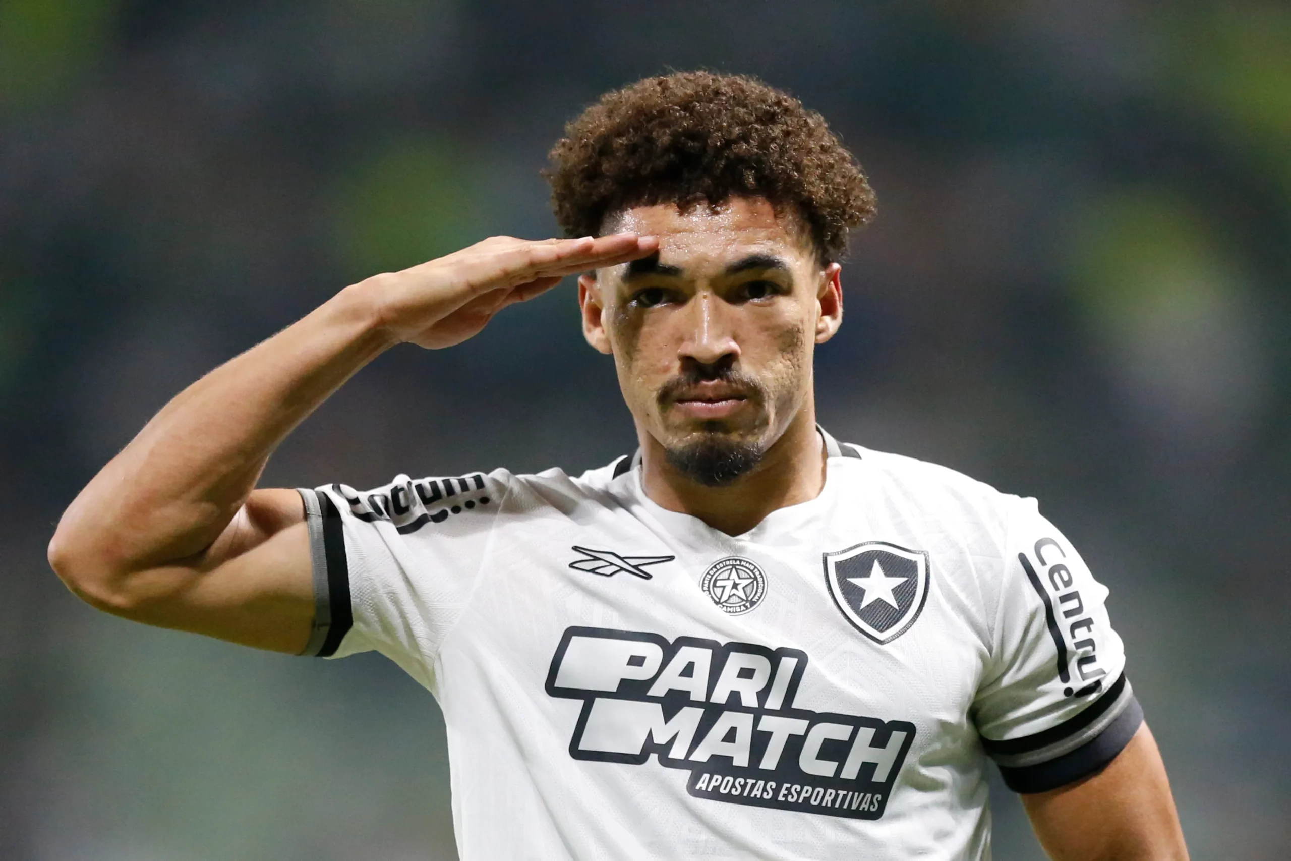 SAO PAULO, BRAZIL – NOVEMBER 26: Adryelson of Botafogo celebrates after scoring the team´s third goal during a match between Palmeiras and Botafogo as part of Brasileirao 2024 at Allianz Parque on November 26, 2024 in Sao Paulo, Brazil. (Photo by Miguel Schincariol/Getty Images)