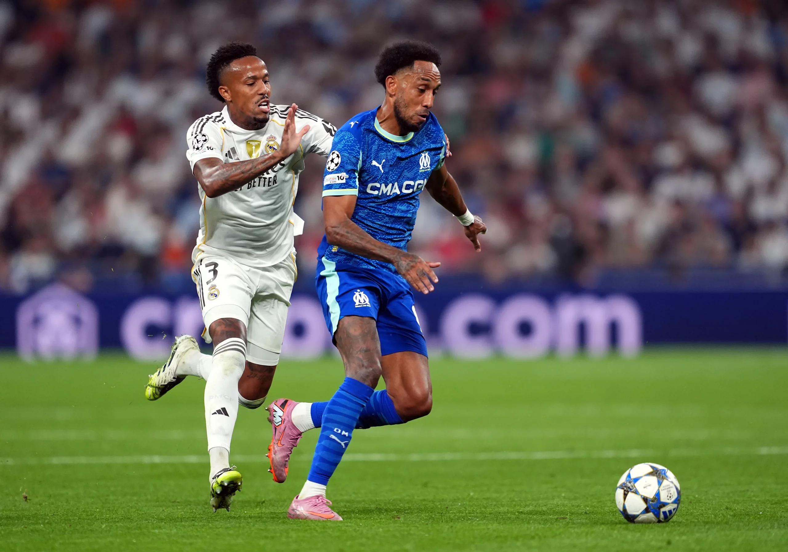 MADRID, SPAIN – SEPTEMBER 16: Pierre-Emerick Aubameyang of Olympique de Marseille is challenged by Eder Militao of Real Madrid during the UEFA Champions League 2025/26 League Phase MD1 match between Real Madrid C.F. and Olympique de Marseille at Estadio Santiago Bernabeu on September 16, 2025 in Madrid, Spain. (Photo by Mateo Villalba Sanchez/Getty Images)