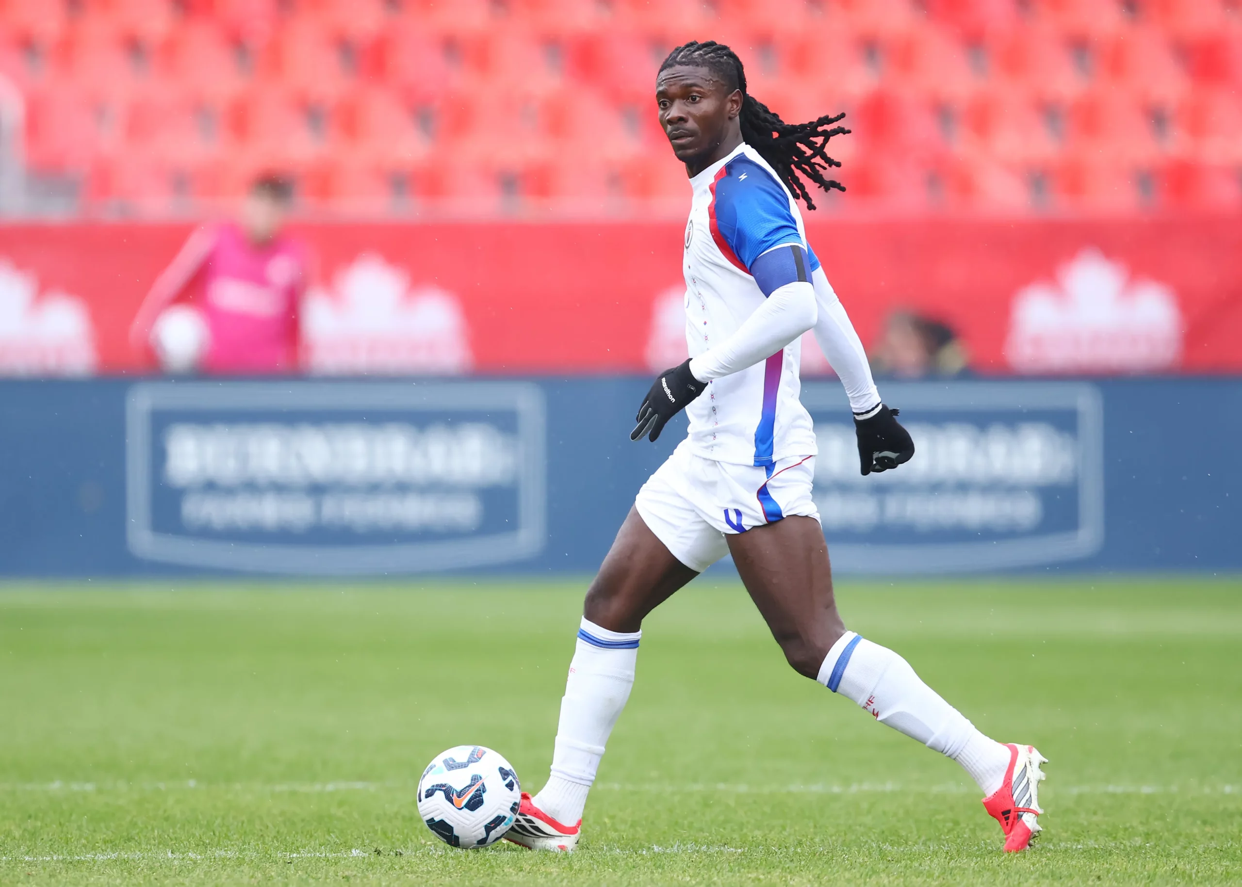TORONTO, ON – MARCH 31:  Ricardo Ade #4 of Haiti dribbles the ball during an International Friendly against Iceland on March 31, 2026 in Toronto, Ontario, Canada.  (Photo by Vaughn Ridley/Getty Images)