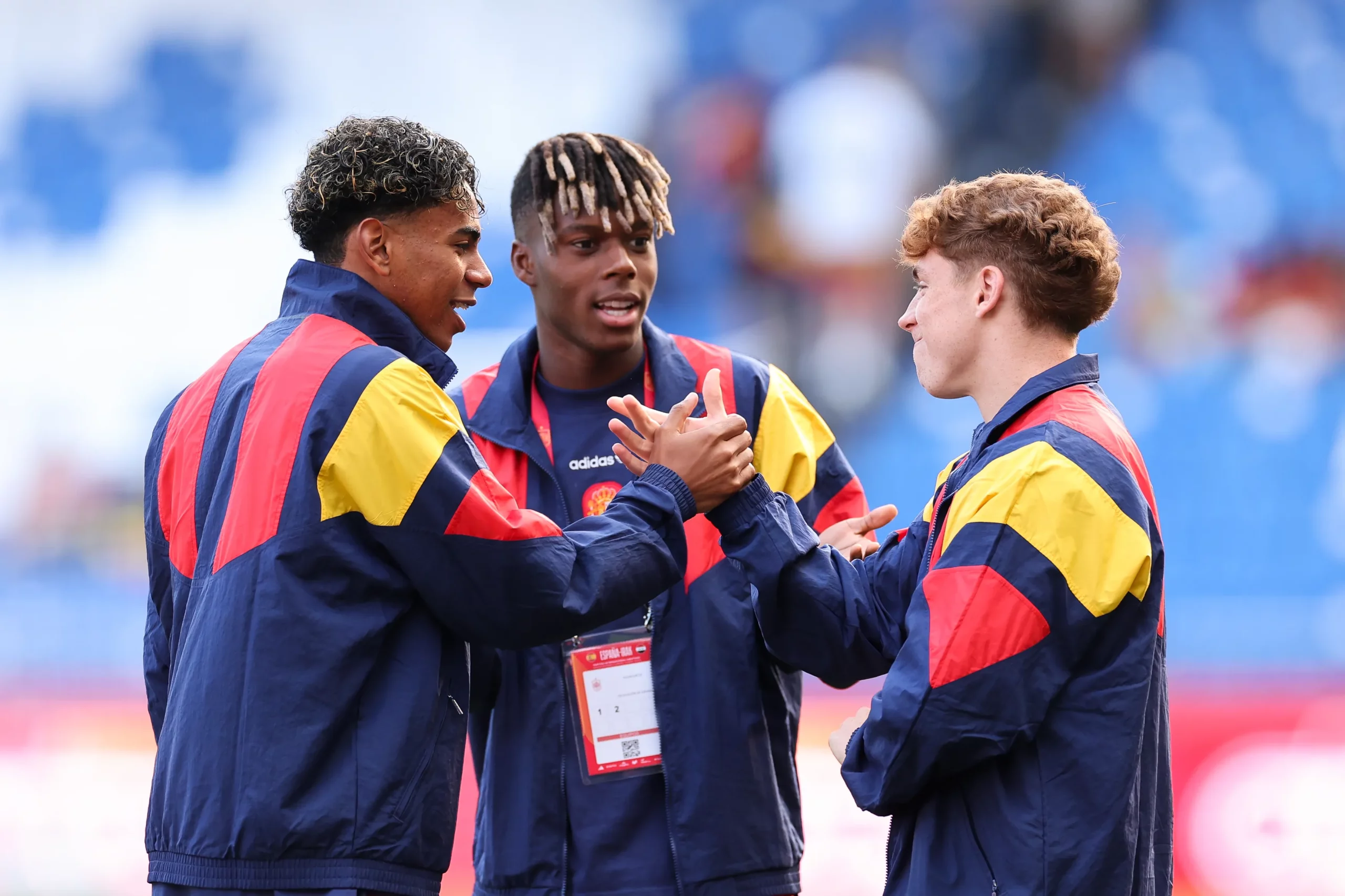 LA CORUNA, SPAIN – JUNE 04: Lamine Yamal, Nico Williams and Victor Munoz of Spain interact prior to the international friendly match between Spain and Iraq at Riazor Stadium on June 04, 2026 in La Coruna, Spain. (Photo by Florencia Tan Jun/Getty Images)