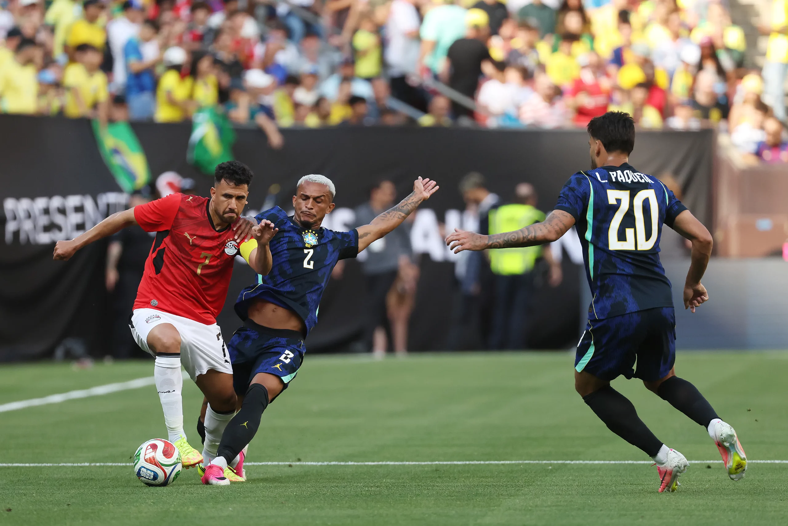 CLEVELAND, OHIO – JUNE 06: Trézéguet of Egypt competes for the ball against Wesley of Brazil during the international friendly match between Brazil and Egypt at Huntington Bank Field on June 06, 2026 in Cleveland, Ohio. (Photo by Kirk Irwin/Getty Images)