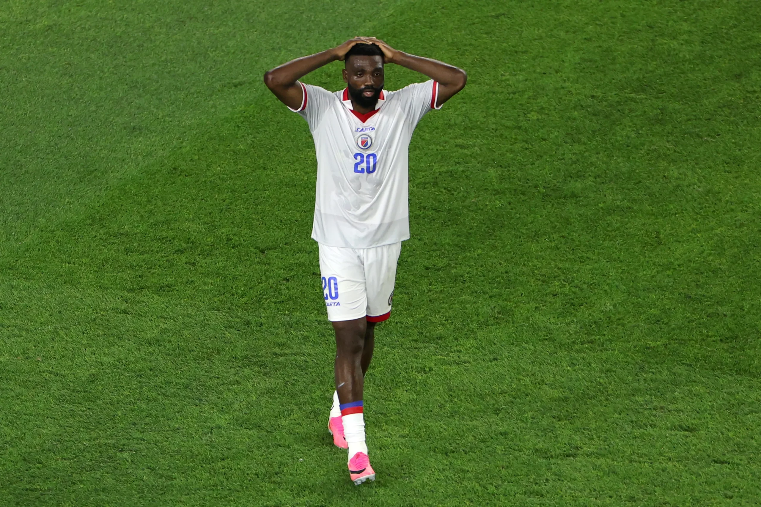 FOXBOROUGH, MASSACHUSETTS – JUNE 13: Frantzdy Pierrot #20 of Haiti reacts after missing a chance during the FIFA World Cup 2026 Group C match between Haiti and Scotland at Boston Stadium on June 13, 2026 in Foxborough, Massachusetts. (Photo by Mattia Ozbot/Getty Images)