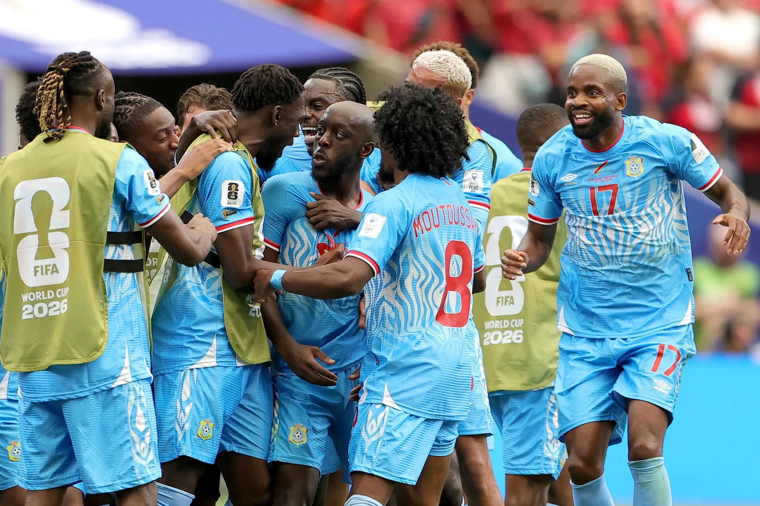 HOUSTON, TEXAS – JUNE 17: Yoane Wissa #20 of Congo DR celebrates with teammates after scoring the team’s first goal during the FIFA World Cup 2026 Group K match between Portugal and Congo DR at Houston Stadium on June 17, 2026 in Houston, Texas. (Photo by Alex Slitz/Getty Images)