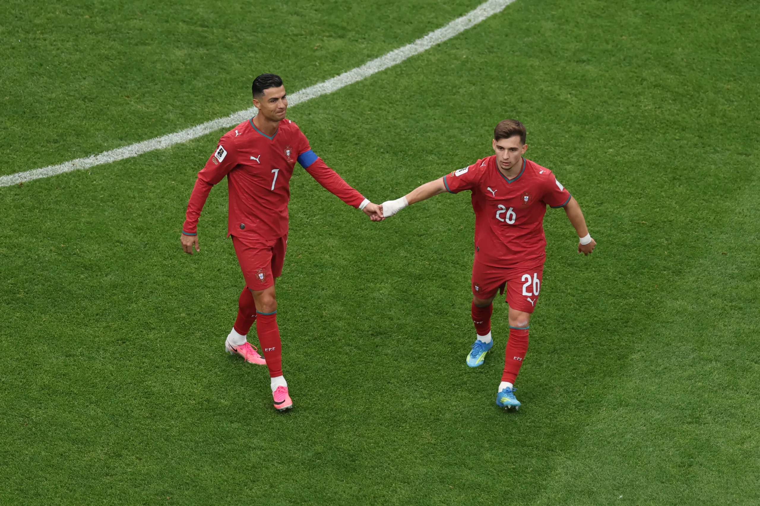Cristiano Ronaldo e Conceição – Foto: Lars Baron/Getty Images