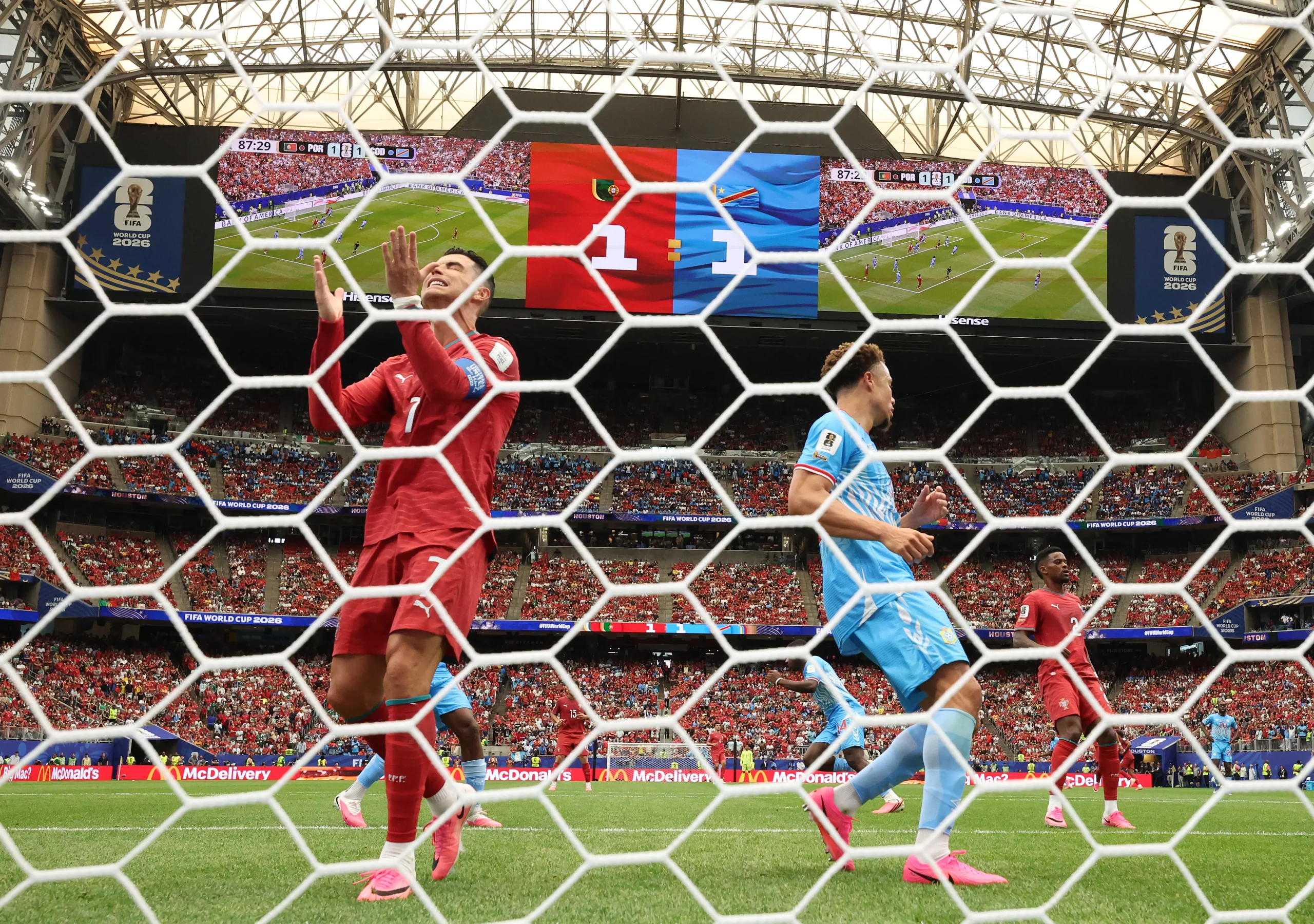 HOUSTON, TEXAS – JUNE 17: (EDITOR’S NOTE: Image was captured using a remote camera from behind the goal.) Cristiano Ronaldo #7 of Portugal reacts after a missed chance during the FIFA World Cup 2026 Group K match between Portugal and Congo DR at Houston Stadium on June 17, 2026 in Houston, Texas. (Photo by Molly Darlington/Getty Images)