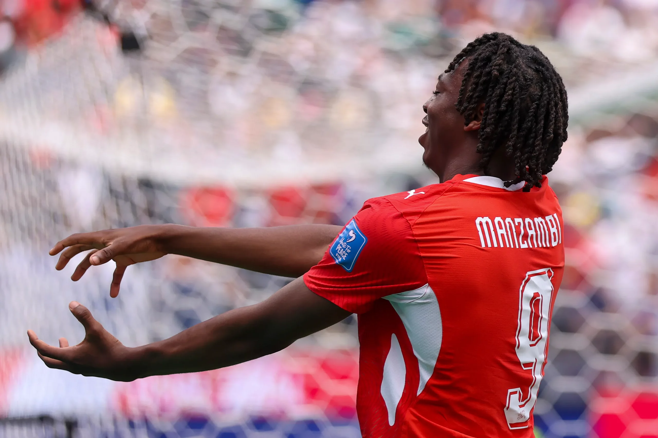 INGLEWOOD, CALIFORNIA – JUNE 18: Johan Manzambi #9 of Switzerland celebrates scoring his team’s first goal during the FIFA World Cup 2026 Group B match between Switzerland and Bosnia and Herzegovina at Los Angeles Stadium on June 18, 2026 in Inglewood, California. (Photo by Dean Mouhtaropoulos/Getty Images)