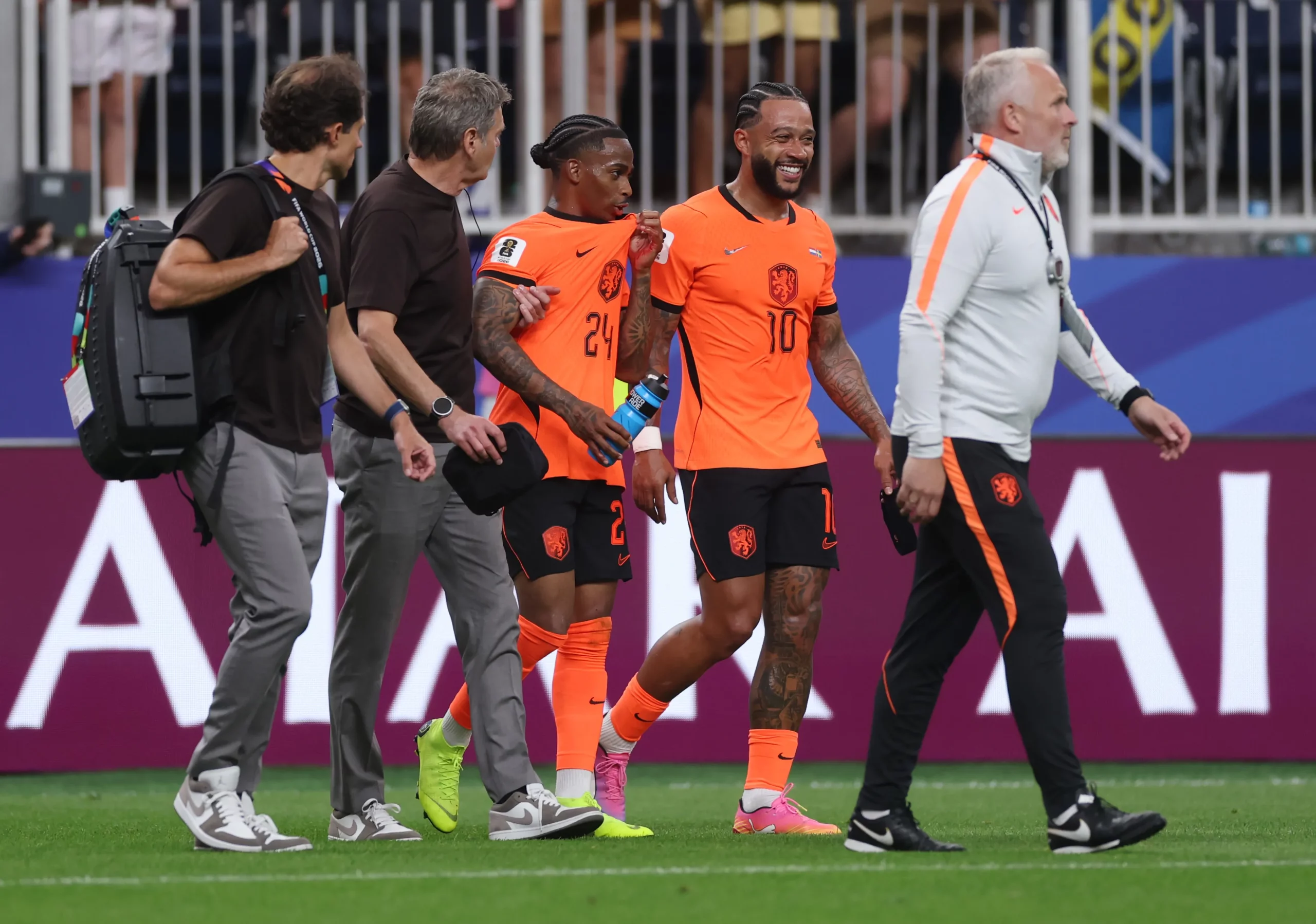 HOUSTON, TEXAS – JUNE 20: Crysencio Summerville #24 and Memphis Depay #10 of the Netherlands celebrate the team’s 5-1 victory in the FIFA World Cup 2026 Group F match between Netherlands and Sweden at Houston Stadium on June 20, 2026 in Houston, Texas. (Photo by Lars Baron/Getty Images)