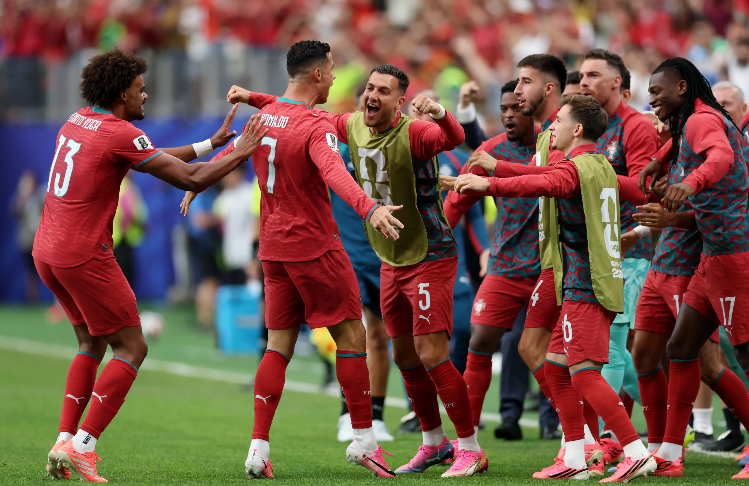 HOUSTON, TEXAS – JUNE 23: Cristiano Ronaldo #7 of Portugal celebrates with teammates after scoring his team’s first goal during the FIFA World Cup 2026 Group K match between Portugal and Uzbekistan at Houston Stadium on June 23, 2026 in Houston, Texas. (Photo by Michael Steele/Getty Images)
