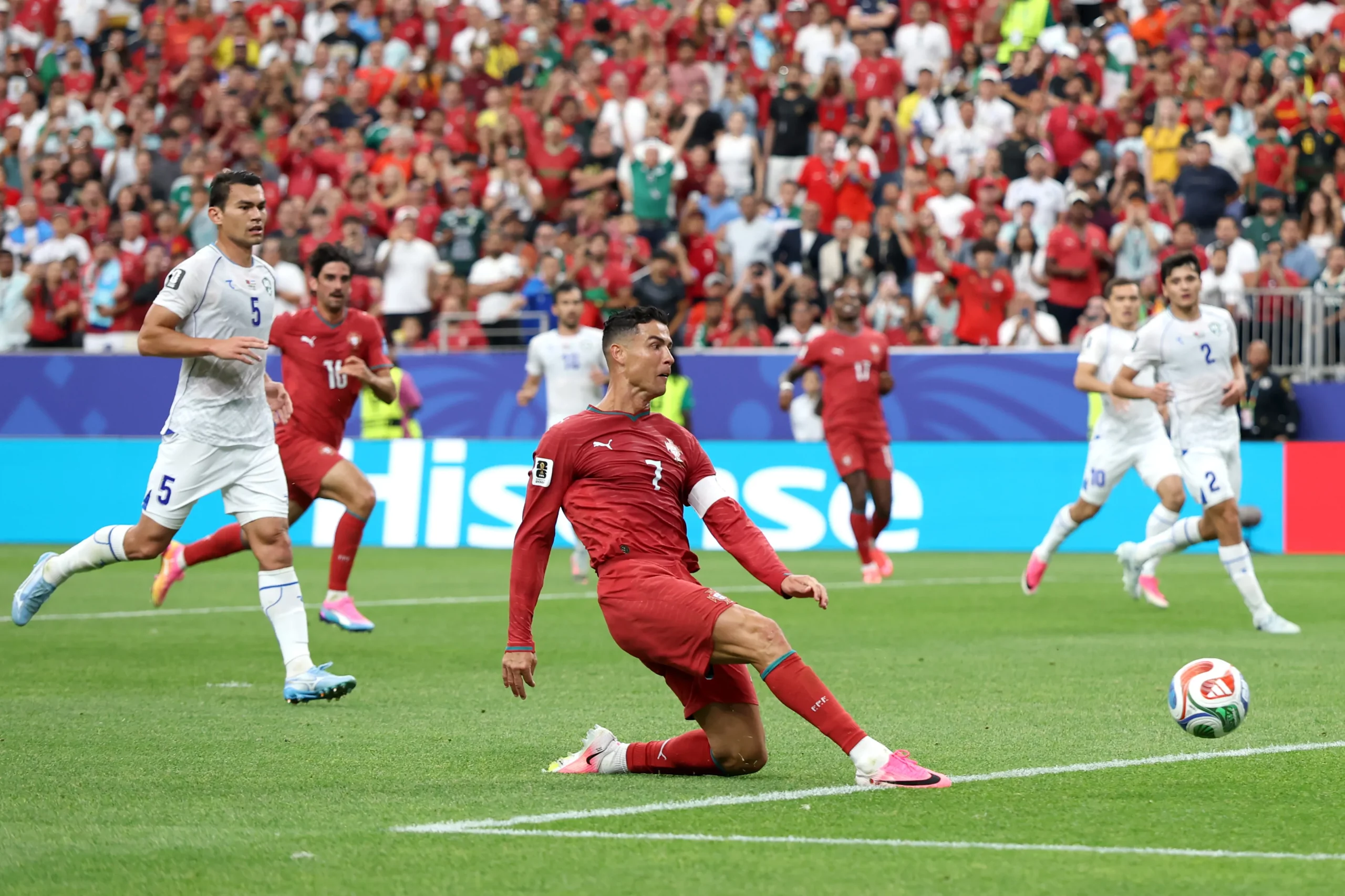 HOUSTON, TEXAS – JUNE 23: Cristiano Ronaldo #7 of Portugal dives for the ball during the FIFA World Cup 2026 Group K match between Portugal and Uzbekistan at Houston Stadium on June 23, 2026 in Houston, Texas. (Photo by Charlotte Wilson/Getty Images)