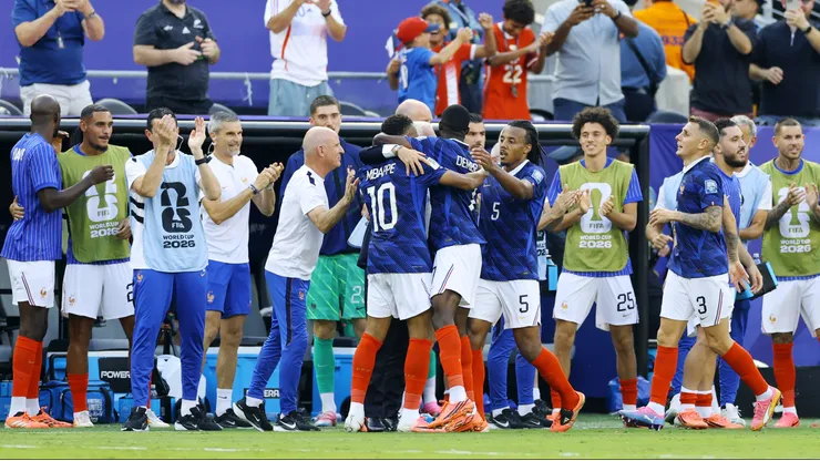 EAST RUTHERFORD, NEW JERSEY - JUNE 30: Kylian Mbappe #10 of France celebrates with Didier Deschamps, Head Coach of France, and teammates after scoring the team's first goal during the FIFA World Cup 2026 Round Of 32 match between France and Sweden at New York New Jersey Stadium on June 30, 2026 in East Rutherford, New Jersey. (Photo by Al Bello/Getty Images)
