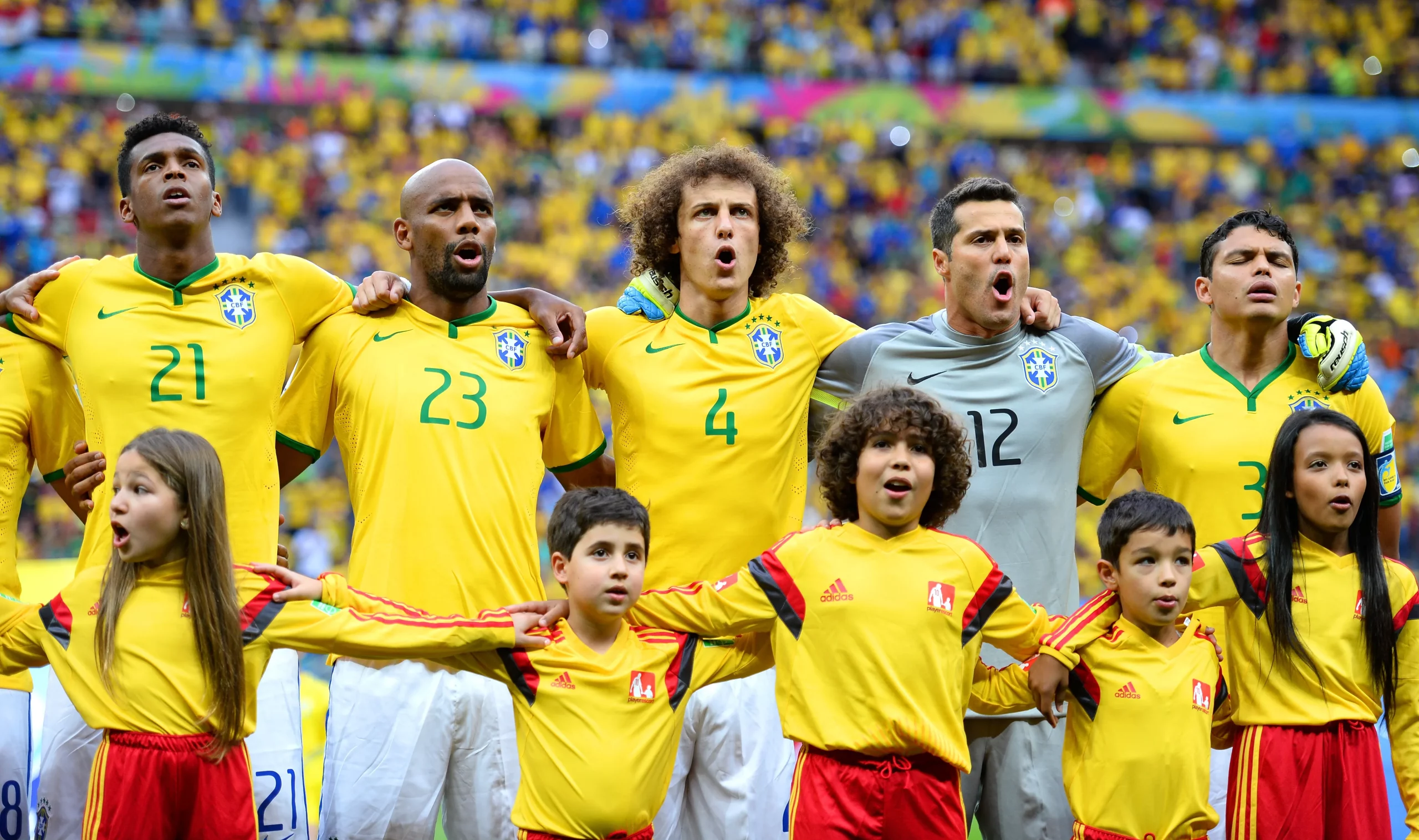 BRASILIA, BRAZIL – JULY 12:  Jo, Maicon, David Luiz, Julio Cesar and Thiago Silva of Brazil sing the National Anthem prior to during the 2014 FIFA World Cup Brazil Third Place Playoff match between Brazil and the Netherlands at Estadio Nacional on July 12, 2014 in Brasilia, Brazil.  (Photo by Jamie McDonald/Getty Images)