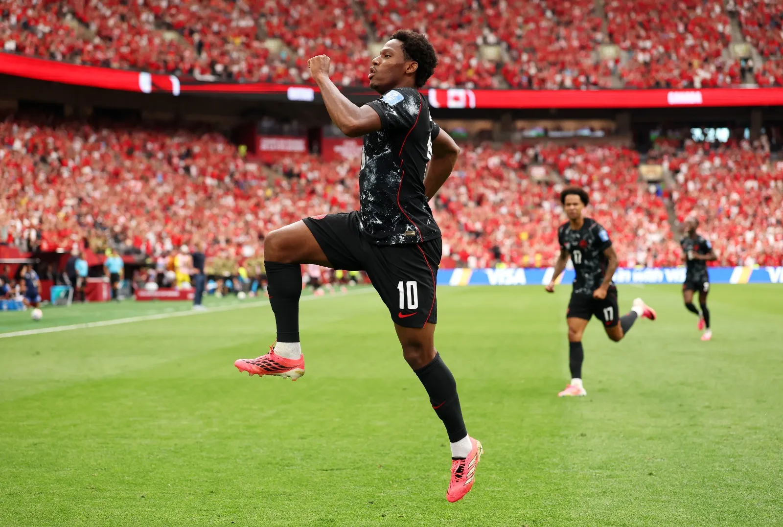 VANCOUVER, BRITISH COLUMBIA – JUNE 18: Jonathan David #10 of Canada celebrates scoring his team’s second goal during the FIFA World Cup 2026 Group B match between Canada and Qatar at BC Place Vancouver on June 18, 2026 in Vancouver, British Columbia. (Photo by Fran Santiago/Getty Images)