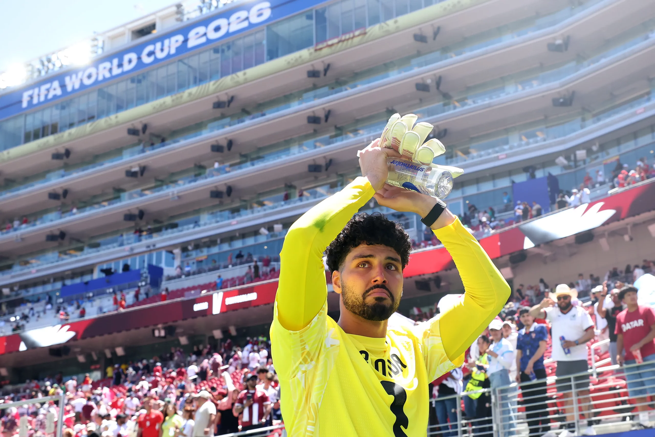 SANTA CLARA, CALIFORNIA – JUNE 13: Mahmoud Abunada #1 of Qatar applauds fans after the 1-1 draw during the FIFA World Cup 2026 Group B match between Qatar and Switzerland at San Francisco Bay Area Stadium on June 13, 2026 in Santa Clara, California. (Photo by Alex Grimm/Getty Images)