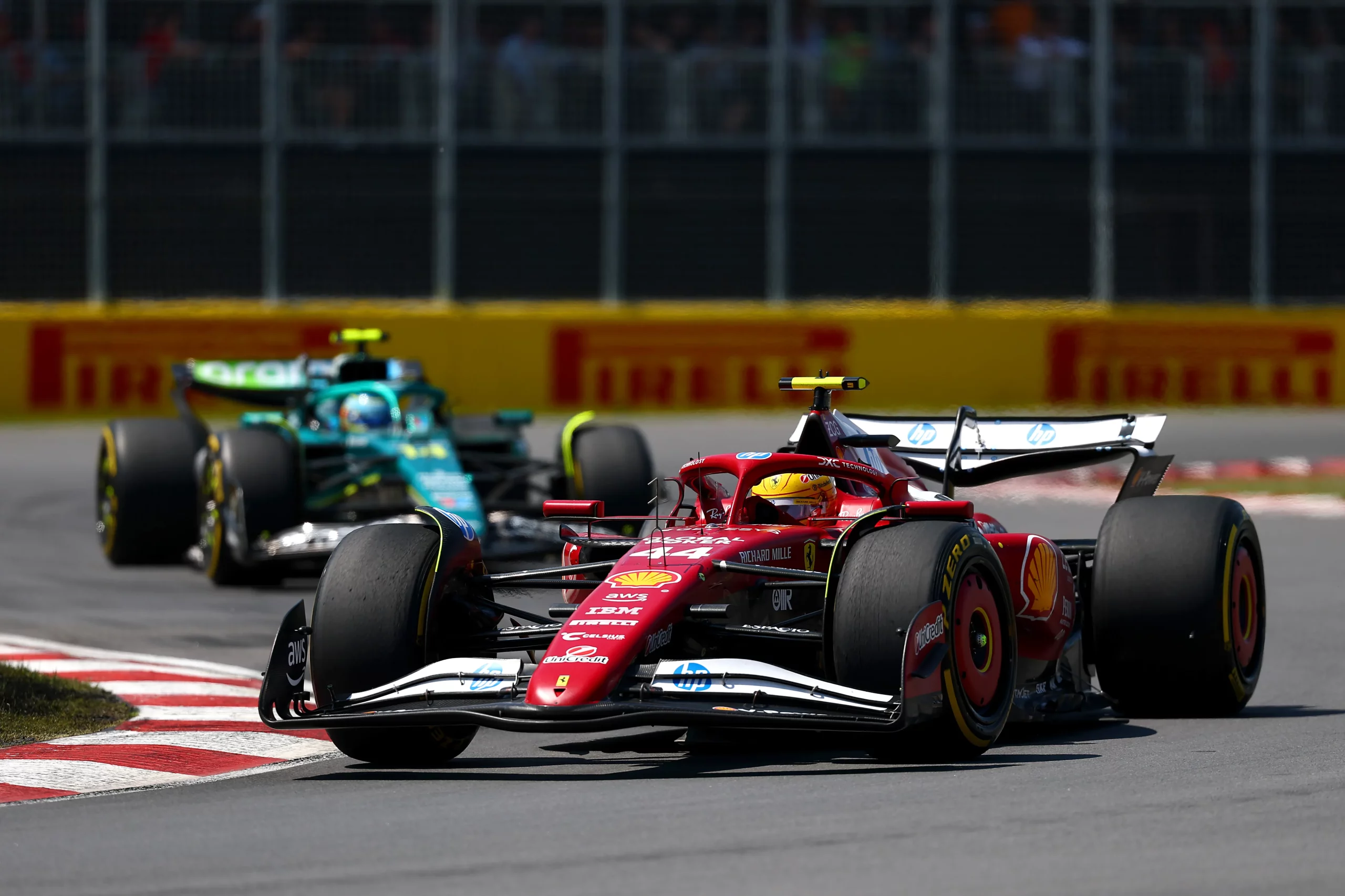 MONTREAL, QUEBEC – JUNE 15: Lewis Hamilton of Great Britain driving the (44) Scuderia Ferrari SF-25 leads Fernando Alonso of Spain driving the (14) Aston Martin F1 Team AMR25 Mercedes on track during the F1 Grand Prix of Canada at Circuit Gilles-Villeneuve on June 15, 2025 in Montreal, Quebec. (Photo by Clive Rose/Getty Images)