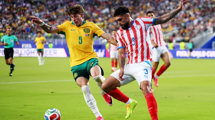 SANTA CLARA, CALIFORNIA - JUNE 25: Jordan Bos #5 of Australia competes for the ball against Omar Alderete #3 of Paraguay during the FIFA World Cup 2026 Group D match between Paraguay and Australia at San Francisco Bay Area Stadium on June 25, 2026 in Santa Clara, California. (Photo by Dean Mouhtaropoulos/Getty Images)