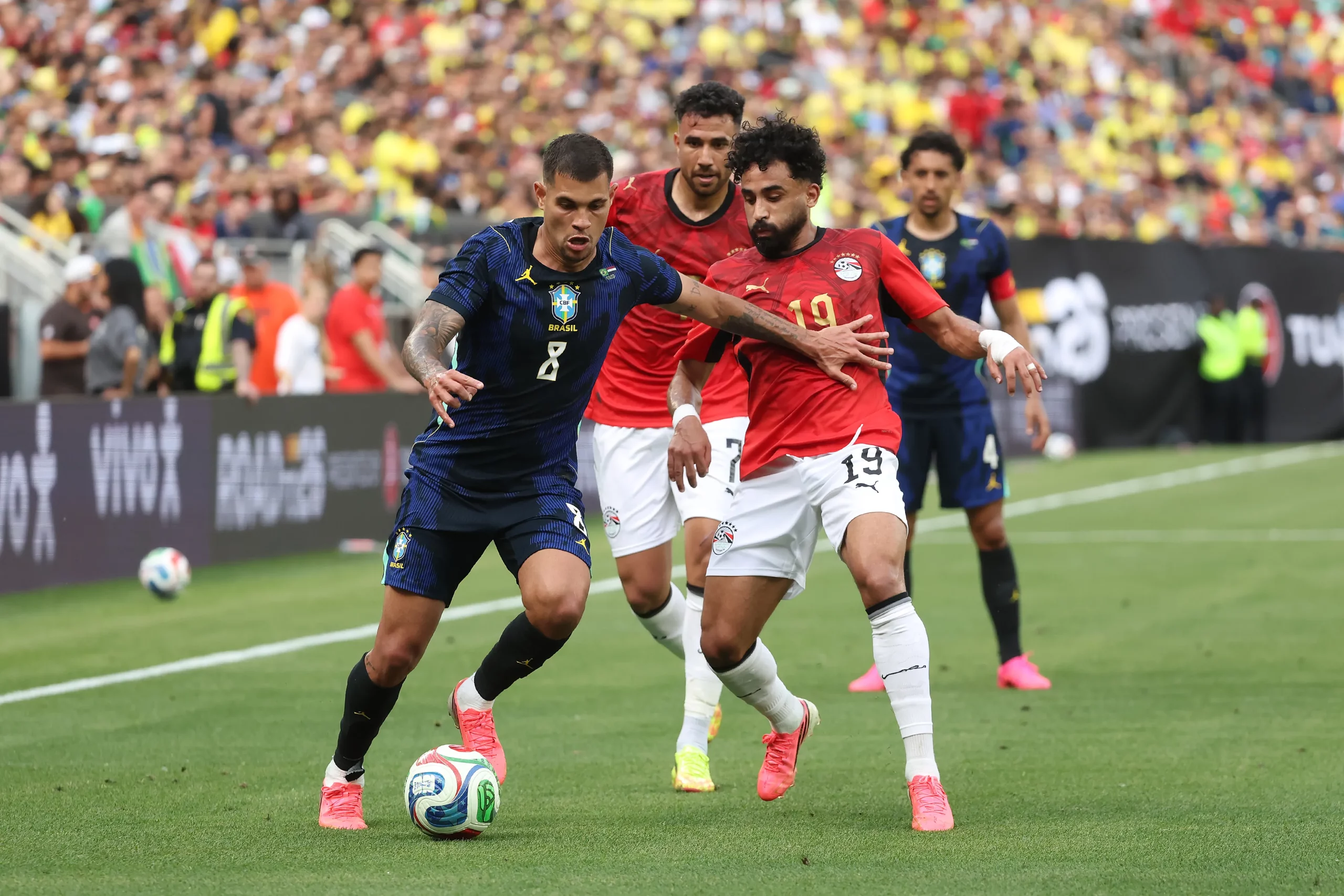 CLEVELAND, OHIO – JUNE 06: Bruno Guimarães of Brazil competes for the ball against Marawan Attia of Egypt during the international friendly match between Brazil and Egypt at Huntington Bank Field on June 06, 2026 in Cleveland, Ohio. (Photo by Kirk Irwin/Getty Images)