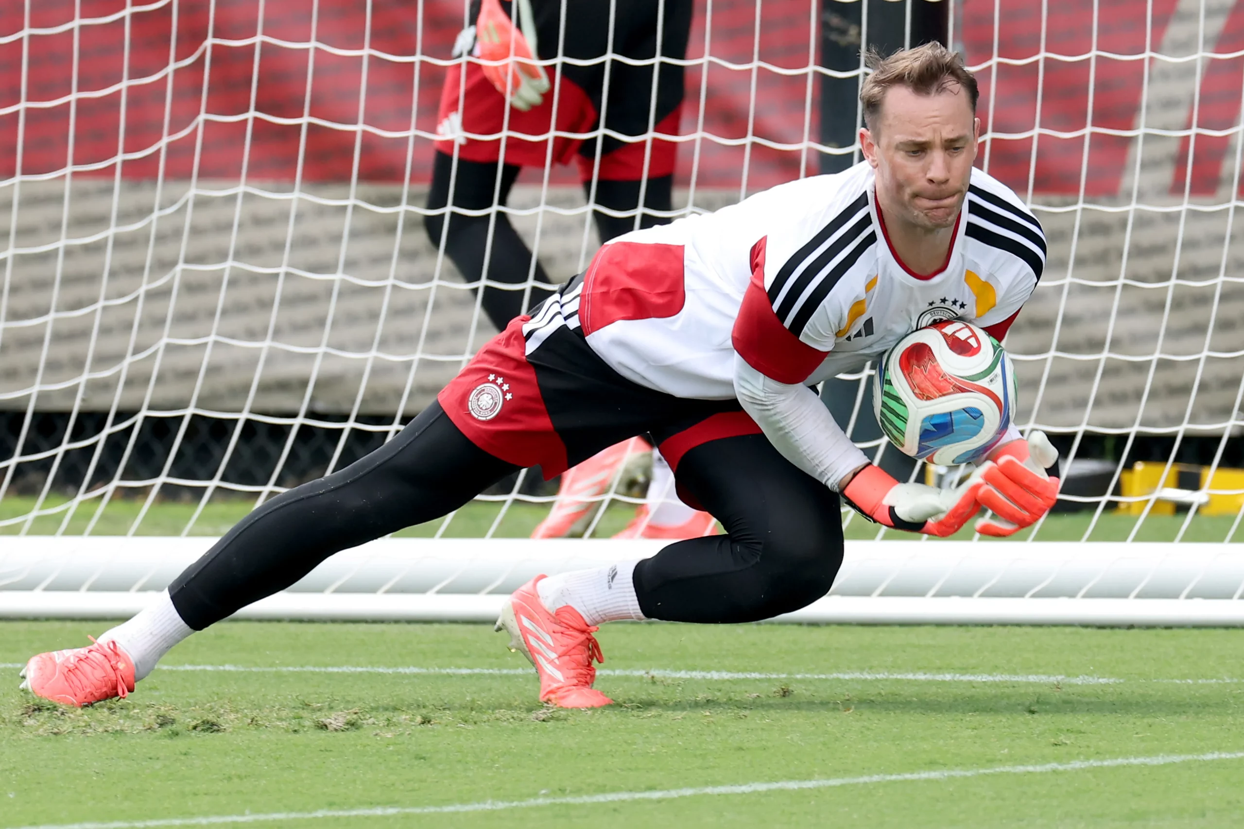 WINSTON-SALEM, NORTH CAROLINA  – JUNE 13: Manuel Neuer of Germany safes the ball during the training session of Germany at W. Dennie Spry Soccer Stadium one day ahead of the FIFA World Cup 2026 Group E match between Germany and Curacao at Houston Stadium on June 13, 2026 in Winston-Salem, North Carolina. (Photo by Alexander Hassenstein/Getty Images)