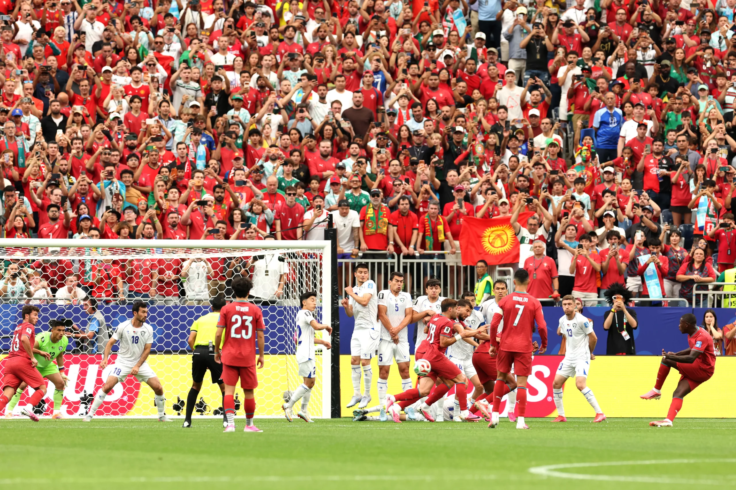 HOUSTON, TEXAS – JUNE 23: Nuno Mendes #25 of Portugal scores his team’s second goal from free kick during the FIFA World Cup 2026 Group K match between Portugal and Uzbekistan at Houston Stadium on June 23, 2026 in Houston, Texas. (Photo by Charlotte Wilson/Getty Images)