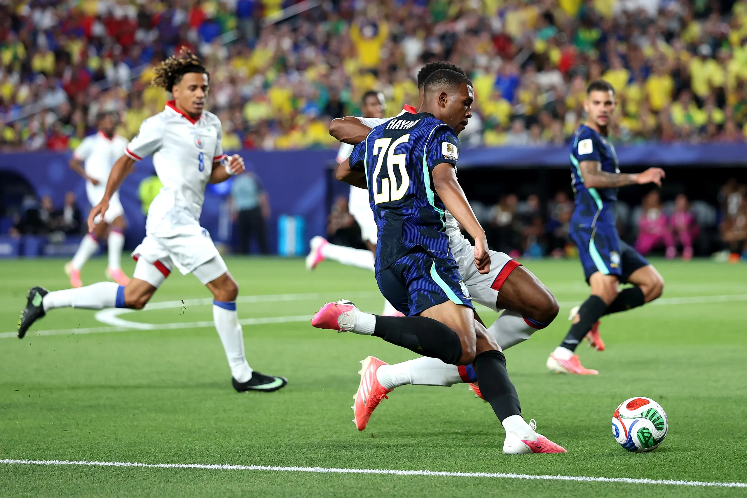 PHILADELPHIA, PENNSYLVANIA – JUNE 19: Rayan #26 of Brazil passes the ball during the FIFA World Cup 2026 Group C match between Brazil and Haiti at Philadelphia Stadium on June 19, 2026 in Philadelphia, Pennsylvania. (Photo by Al Bello/Getty Images)