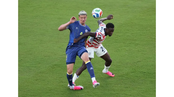 SANTA CLARA, CALIFORNIA - JULY 01: Folarin Balogun #20 of the United States fouls Tarik Muharemovic #4 of Bosnia and Herzegovina which is later reviewed by VAR and awarded as a red card foul a during the FIFA World Cup 2026 Round of 32 match between USA and Bosnia and Herzegovina at San Francisco Bay Area Stadium on July 01, 2026 in Santa Clara, California. (Photo by Michael Steele/Getty Images)