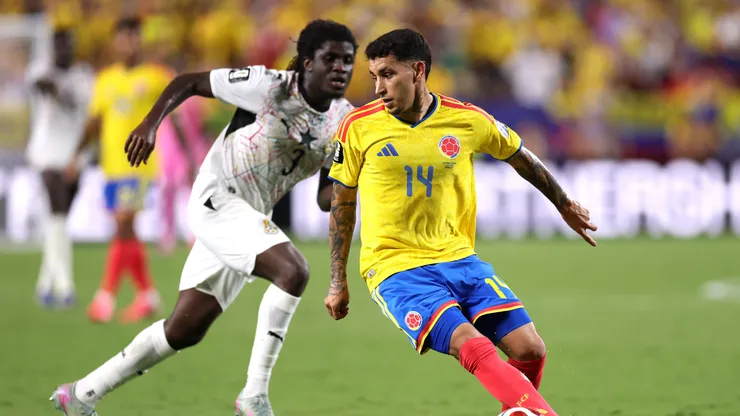KANSAS CITY, MISSOURI - JULY 03: Gustavo Puerta #14 of Colombia controls the ball under pressure from Caleb Yirenkyi #3 of Ghana during the FIFA World Cup 2026 Round of 32 match between Colombia and Ghana at Kansas City Stadium on July 03, 2026 in Kansas City, Missouri. (Photo by Luke Hales/Getty Images)